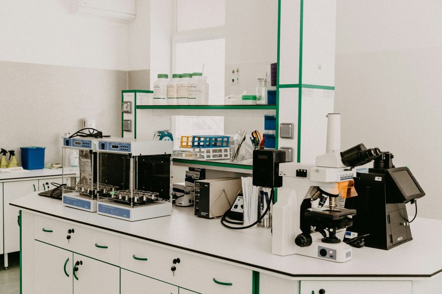 Research laboratory bench with a microscope and analytical equipment